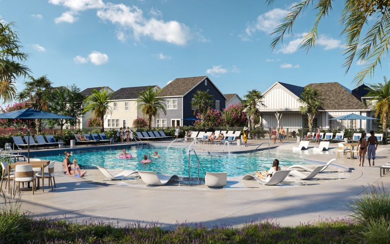a swimming pool in front of a large building